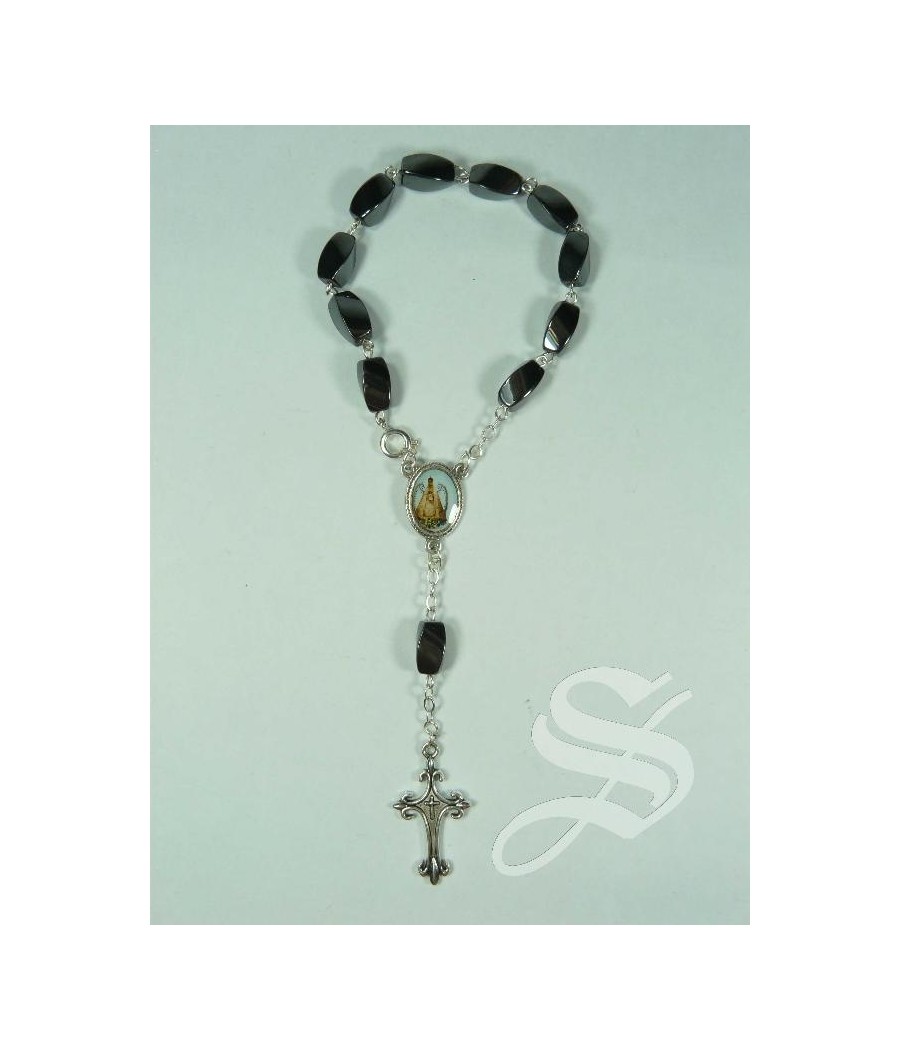 DECENA CRISTAL NEGRO CON CAPUCHONES VIRGEN DEL PRADO 7MM