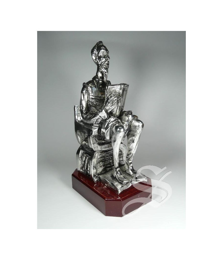 FIGURA D. QUIJOTE SENTADA LEYENDO 27 CM BAÑO PLATA