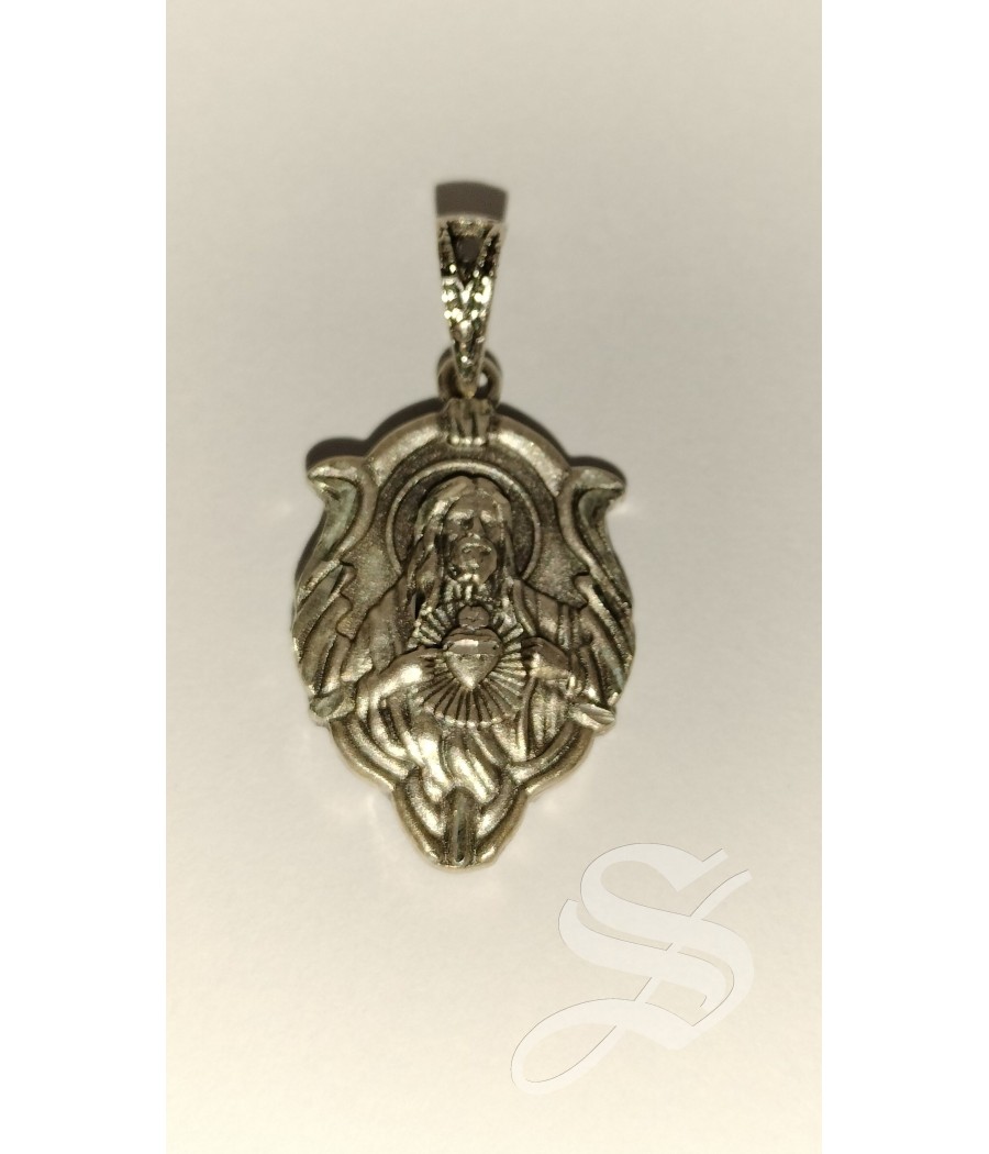 MEDALLA VIRGEN DEL CARMEN ESCAPULARIO PLATA OVAL CON HOJAS 23 X 14 MM.