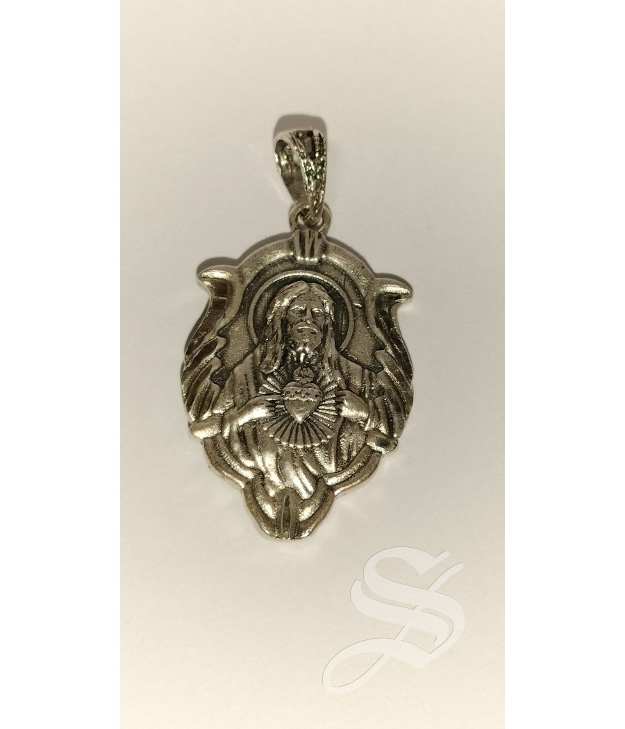 MEDALLA VIRGEN DEL CARMEN ESCAPULARIO PLATA OVAL CON HOJAS 28 X 18 MM