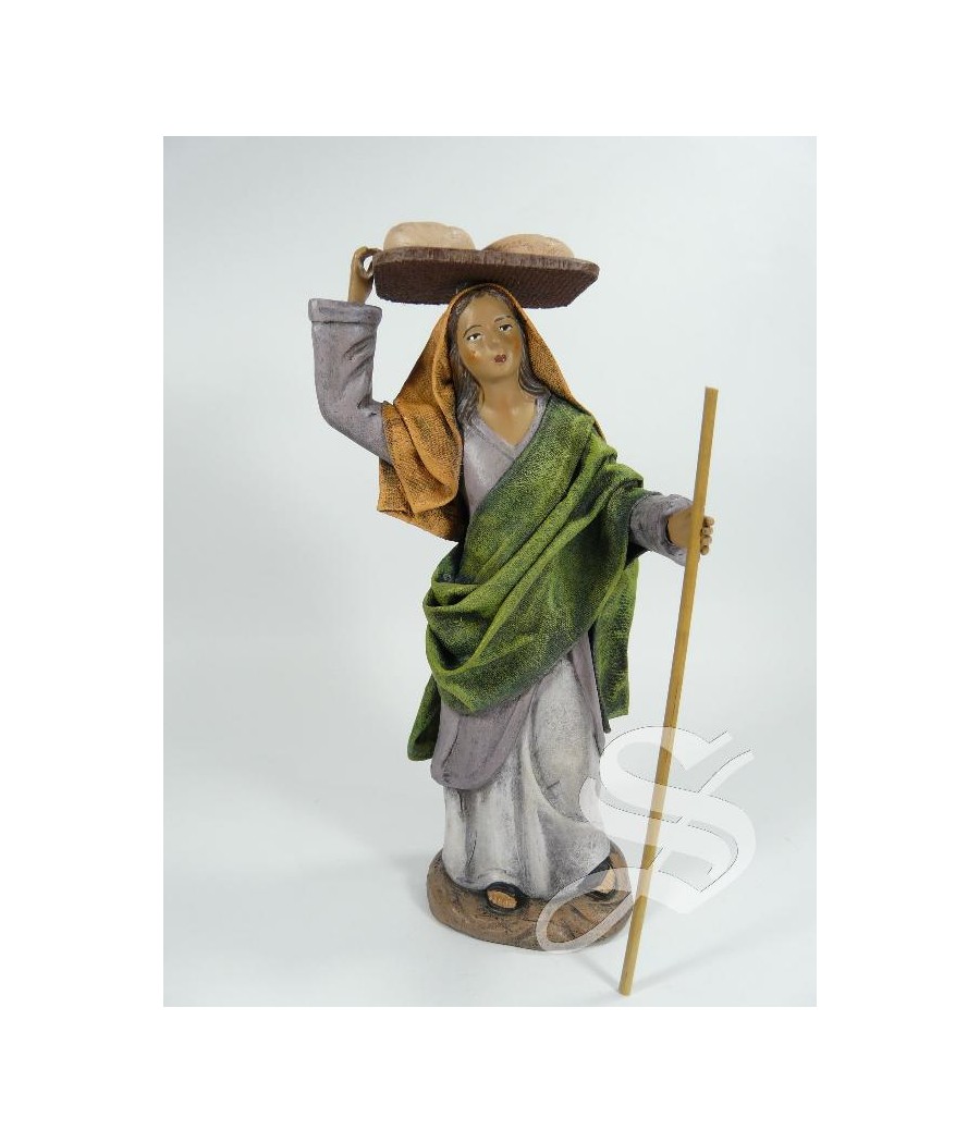 PASTORA CON TABLA DE PAN 17 CM. BARRO LIENZADO