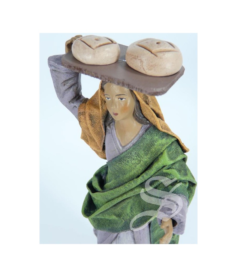 PASTORA CON TABLA DE PAN 17 CM. BARRO LIENZADO