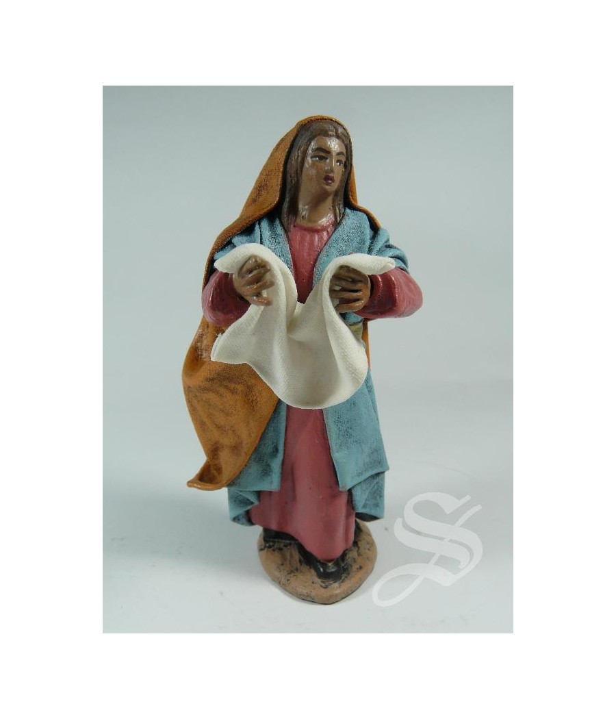 PASTORA TENDIENDO ROPA EN 10 CM.