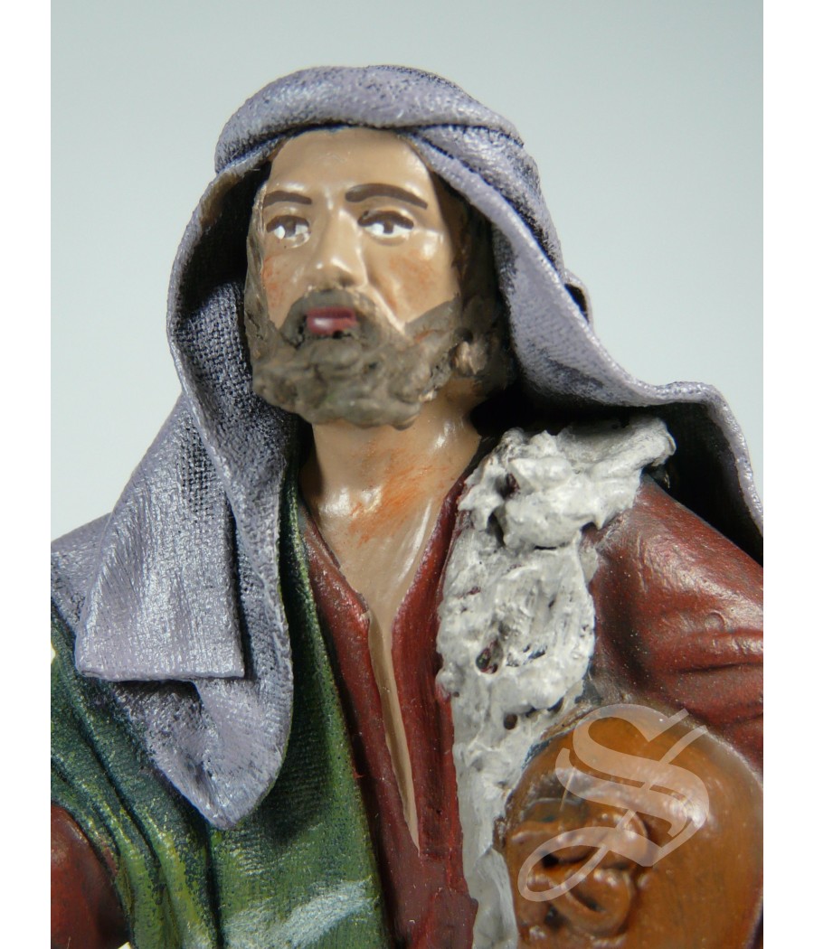 PASTOR CON SACO AL BRAZO 12 CM.