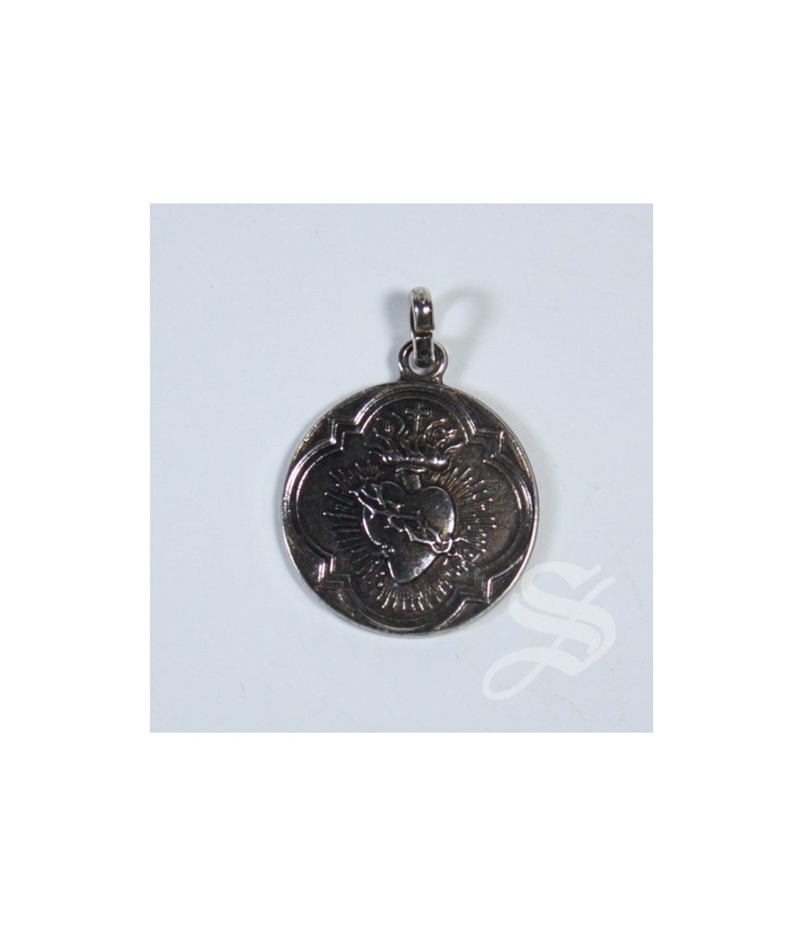 MEDALLA DETENTE  CORAZON DE JESUS 20 MM. BAÑO PLATA 5 MIC.