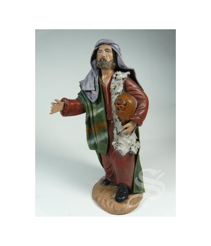 PASTOR CON SACO AL BRAZO 12 CM.